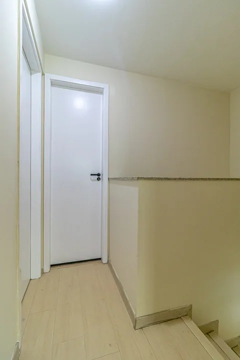 Hall dos quartos no Top Duplex